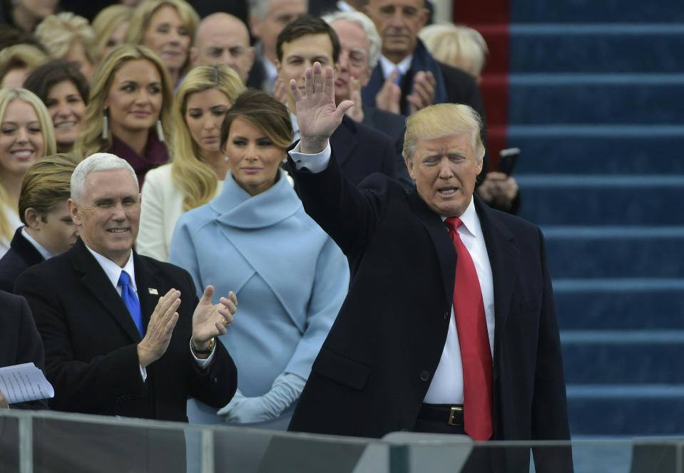  Future Vice-President Mike Pence was seen clapping as Trump waved to the crowds