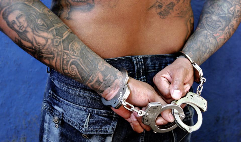  A MS-13 leader is presented to reporters by police in El Salvador