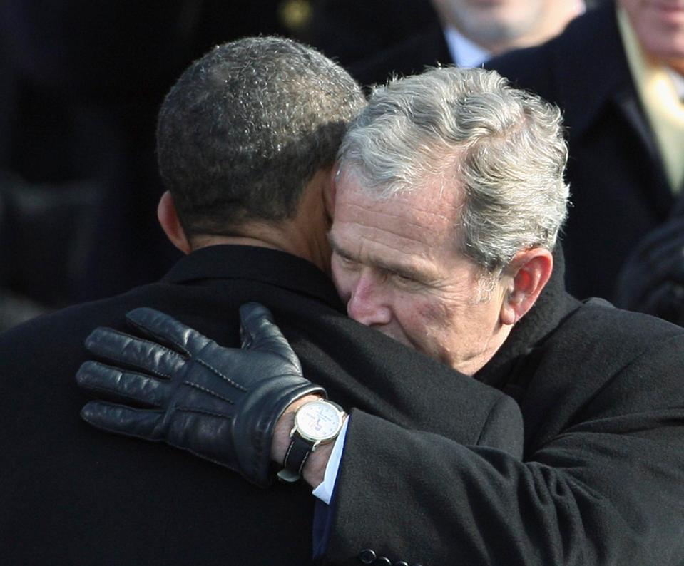  Bush hugged Barack Obama as he handed power over to the Democrat in 2009