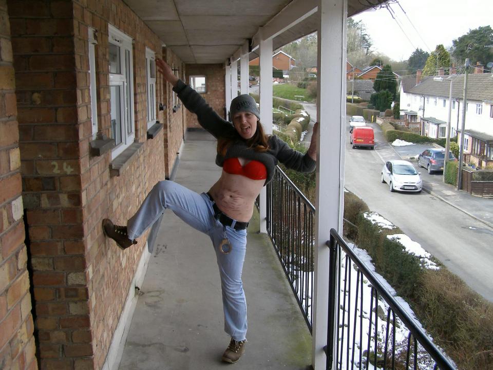  Joanna Dennehy poses with her top lifted, revealing her underwear after carrying out the murders