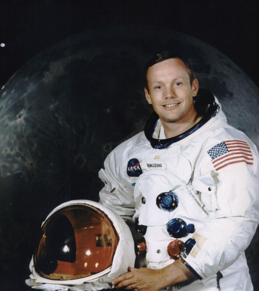  Neil Armstrong, donned in his space suit, poses for his official Apollo 11 portrait