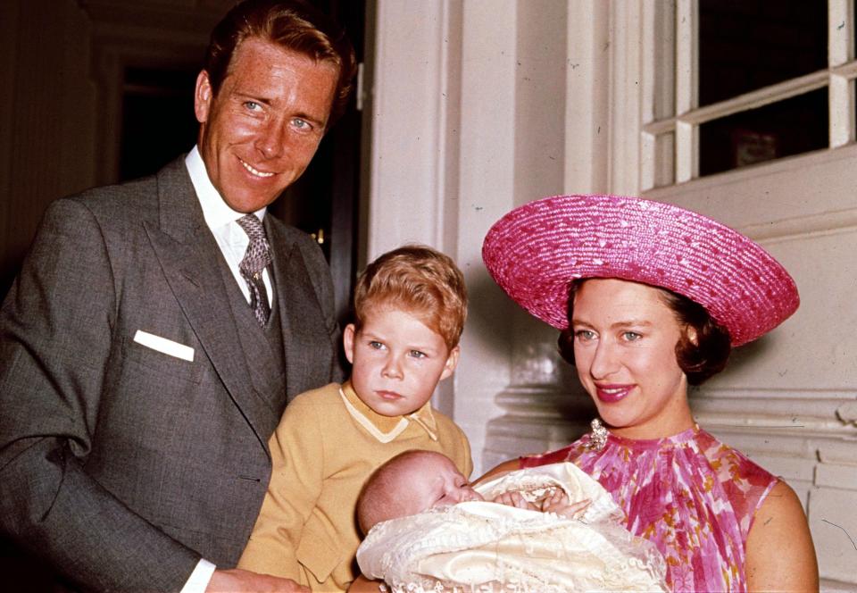  Princess Margaret and Lord Snowdon with their kids Viscount Linley, second left, and the infant Lady Sarah Armstrong-Jones in 1964 at Kensington Palace in London