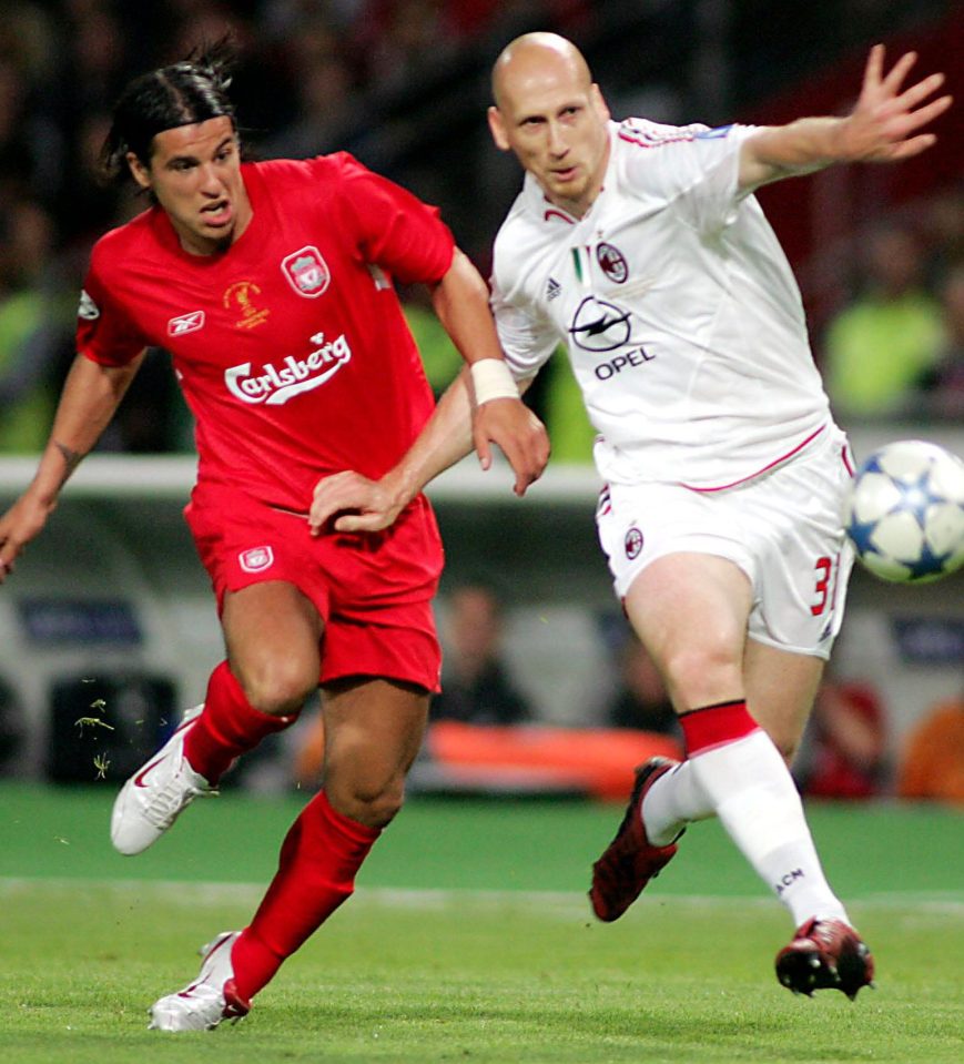  Stam in action for AC Milan against Milan Baros of Liverpool