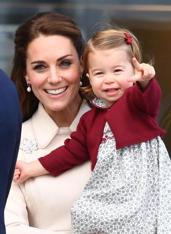  Meghan especially loved meeting Princess Charlotte and got to play with the youngest royal