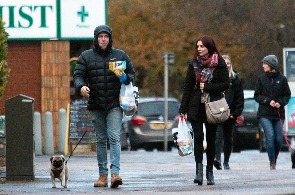  Snap of the couple walking their pug