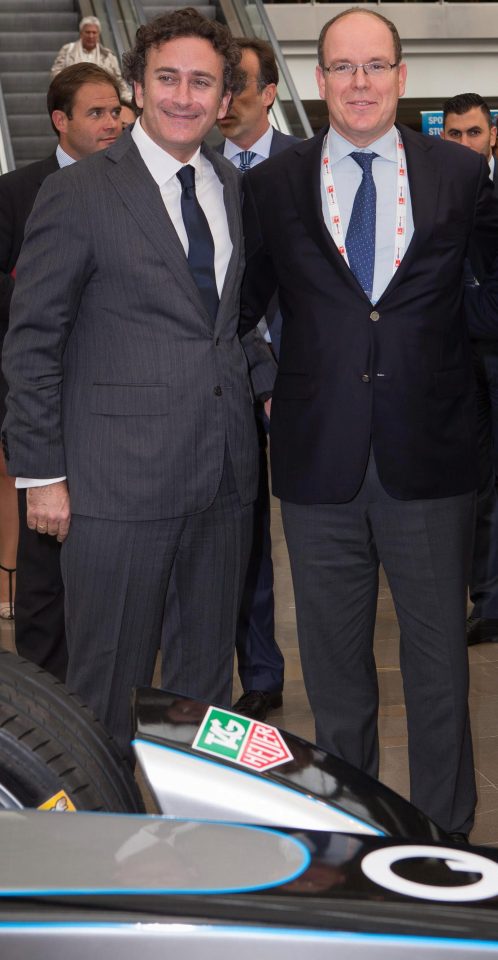  Motor racing fan Andrea Radrizzan posing with Prince Albert II of Monaco