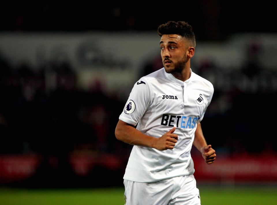  Neil Taylor has headed in the opposite direction as part of the deal