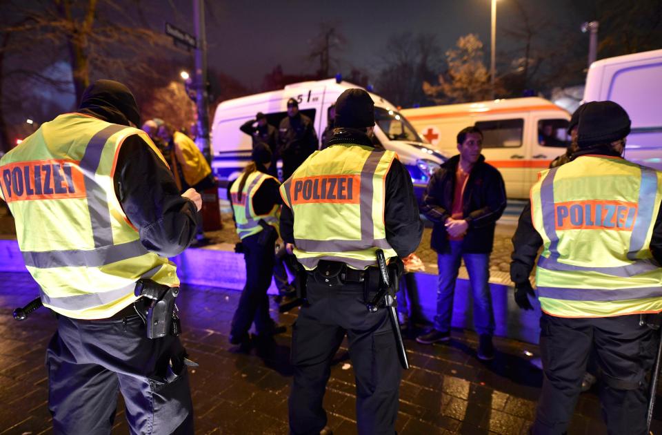  German police officers perform security checks ahead of the New Year celebrations in Hamburg