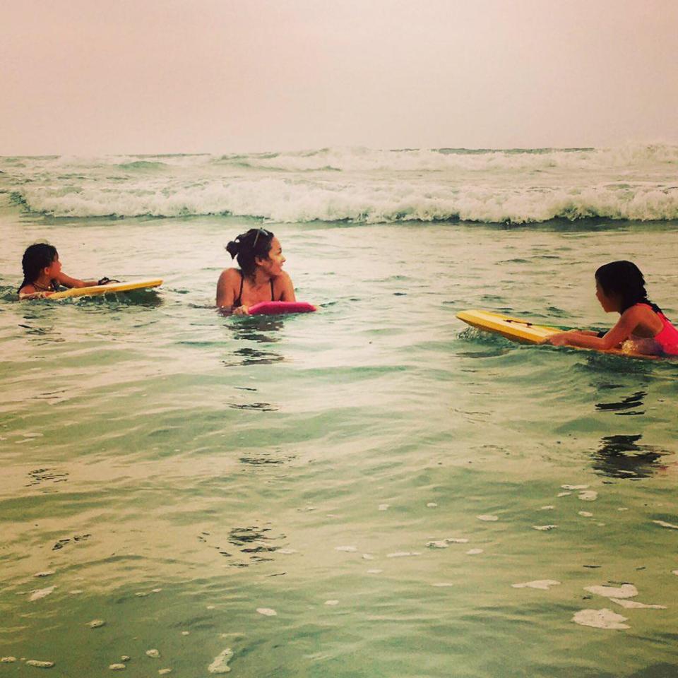  Myleene with her daughters in the sea