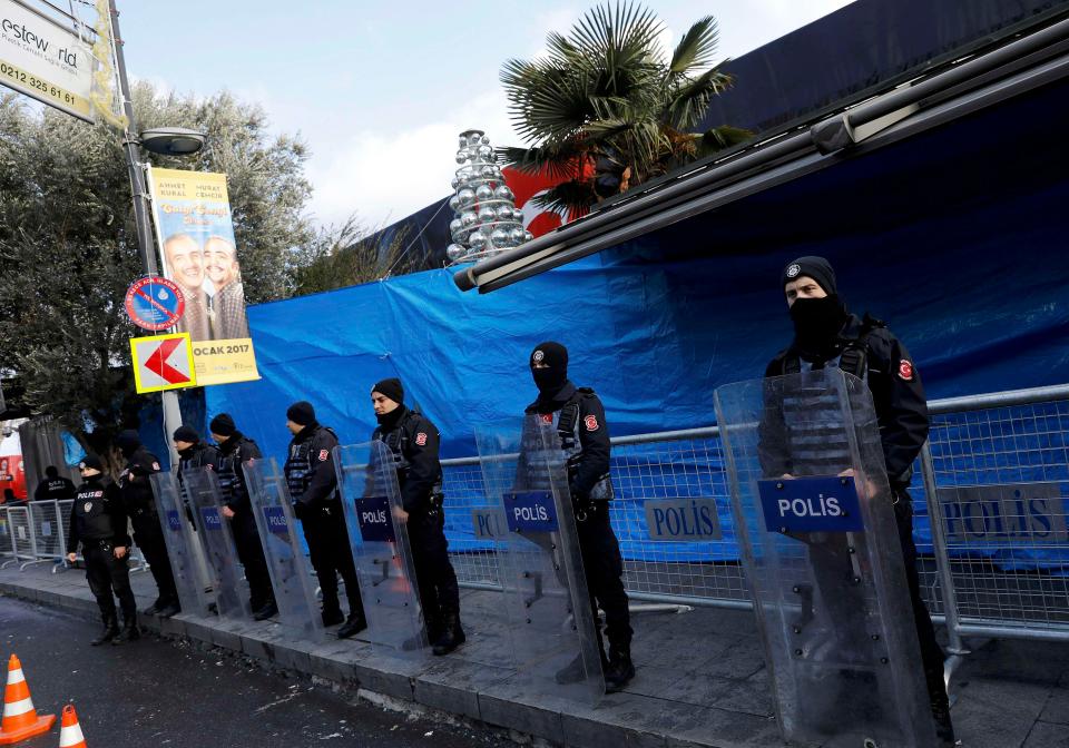  Turkish police stand guard outside the closed Reina nightclub after the attack