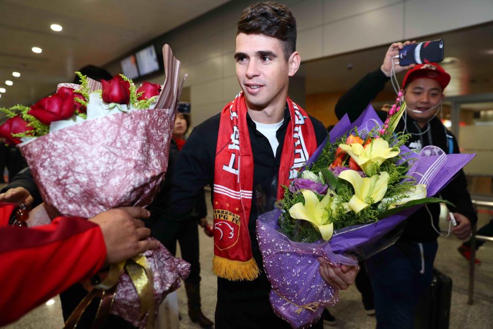  Oscar arrived in China to a hero's welcome after his £60million move