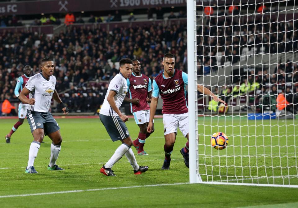  Jesse Lingard hits his rebound against the post