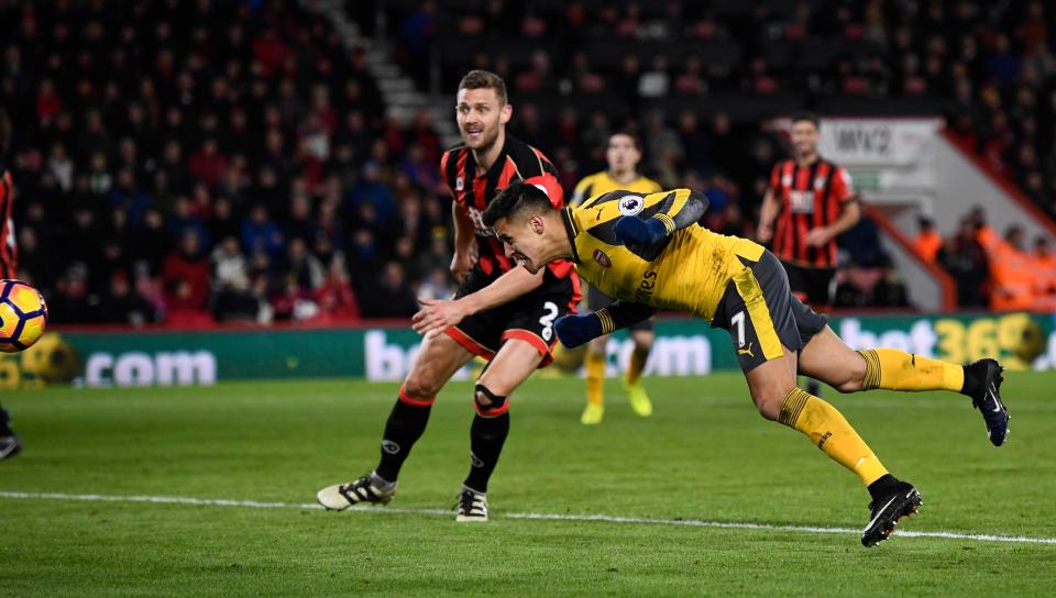  Alexis Sanchez gives Arsenal hope with a diving header