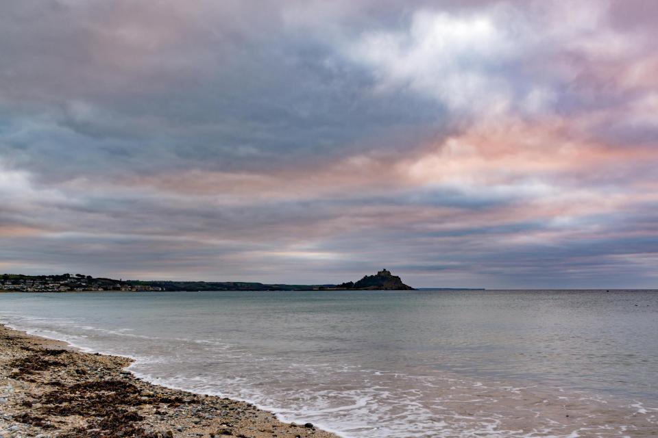  A cloudy start to the day at Marazion, Cornwall, with warmer sunrise temperatures of 9C after a week of chilly starts