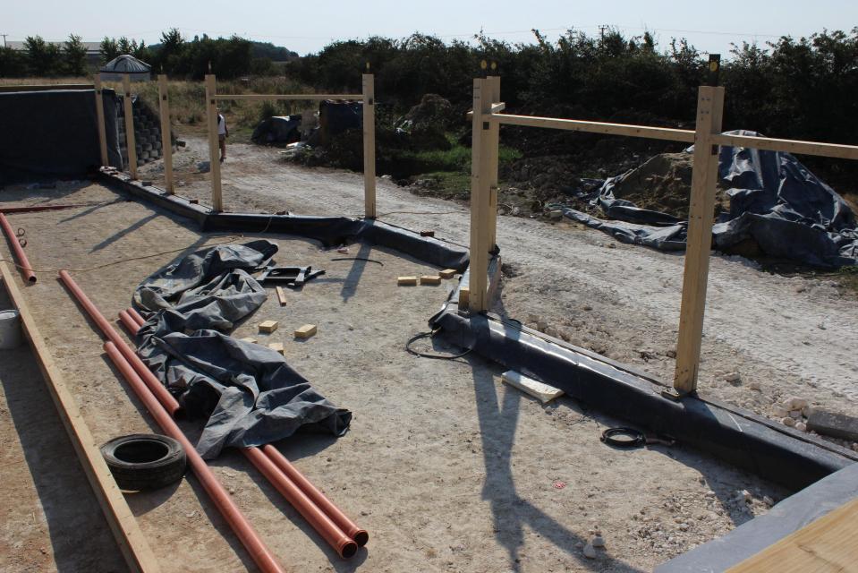  The 'earthship' home sits below ground and is meant to heat itself thanks to the unique construction method