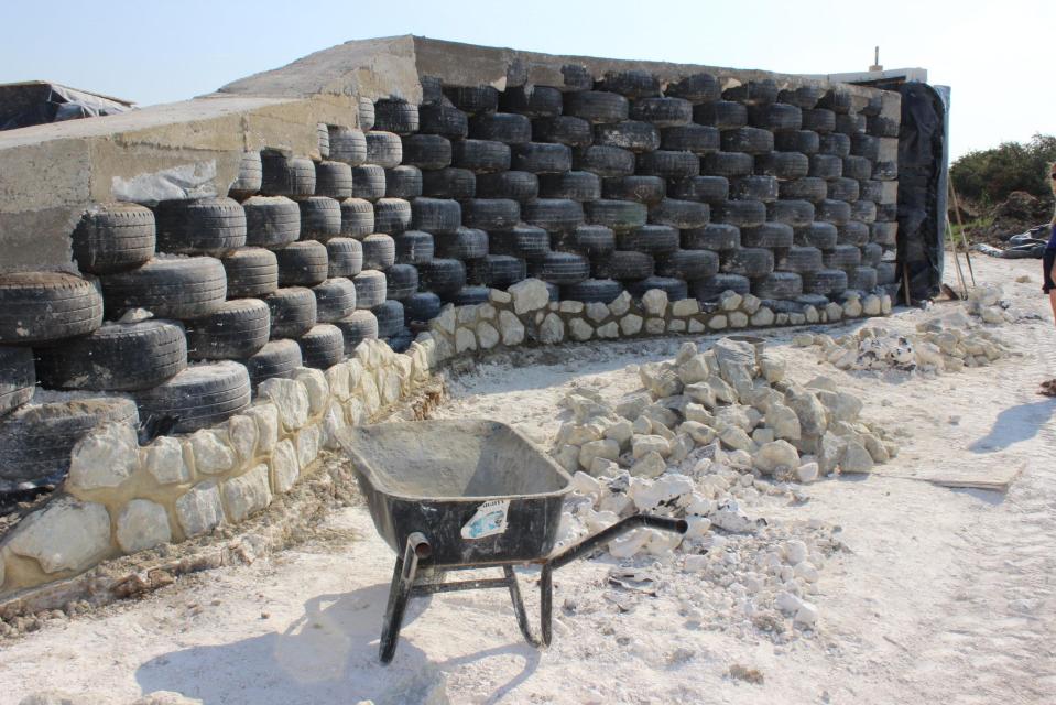  The walls of the Hobbit House are made from 800 old car tyres filled with chalk and covered with mud