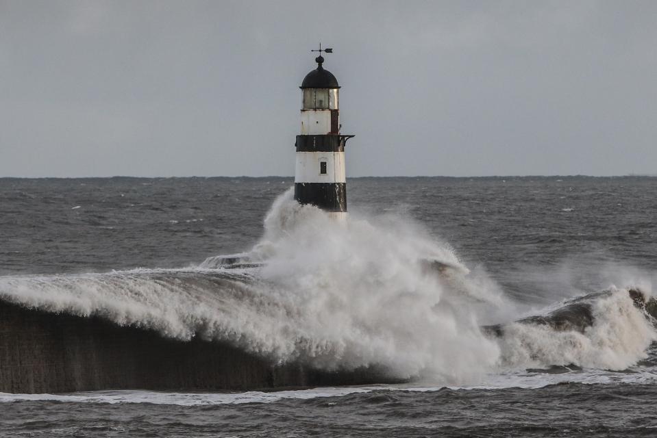  Stormy seas hit against Seaham Harbour and lighthouse on the County Durham coast as temperatures are set to become more mild this weekend