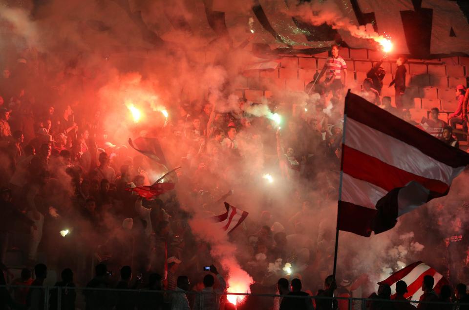  Flares were lit during the friendly clash before violence broke out