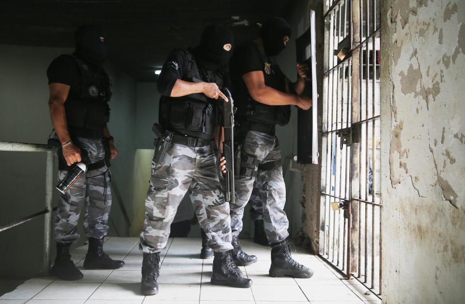  Military Police patrol the complex which has seen as many as 60 inmates killed in a single year