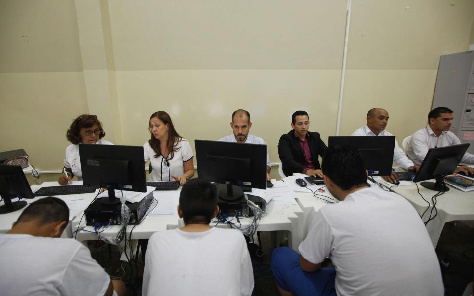  Inmates meet with attorneys to update their cases in the overcrowded Puraquequara prison