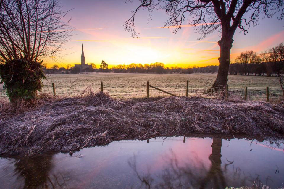  Frost gathers on ground near Salisbury Cathedral this morning after the coldest winter night so far in England