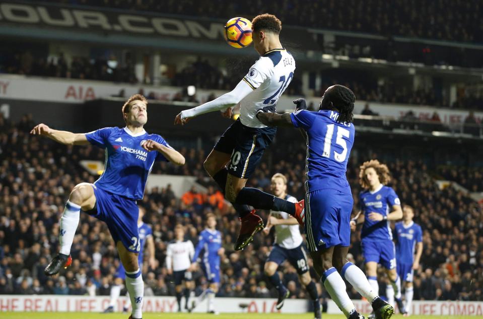  Dele Alli scored twice to help Tottenham end the 13-match winning streak of Chelsea