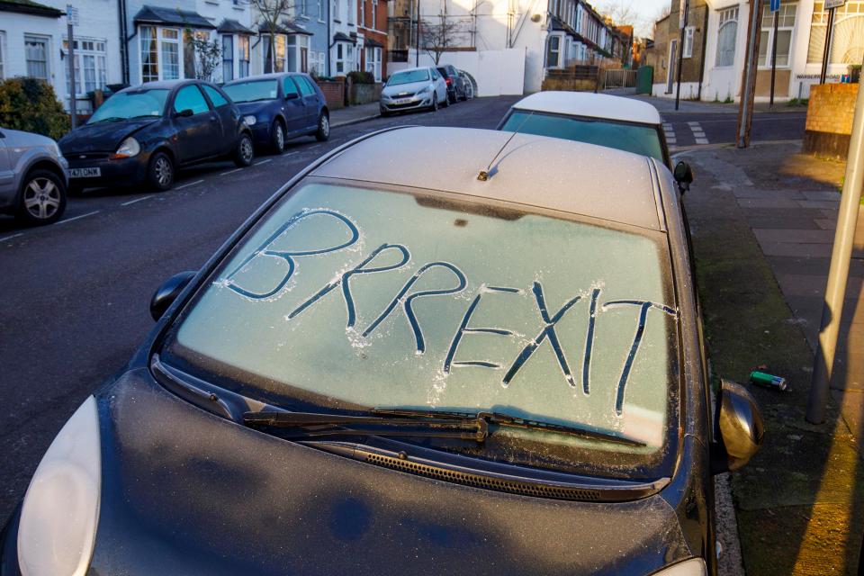  Jokers write 'Brrexit' on a frozen car windscreen in north London this morning as temperatures fell to below zero