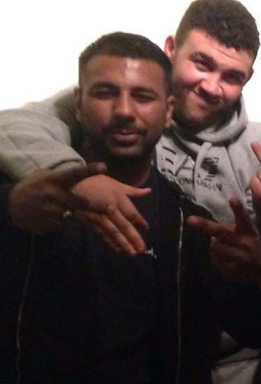  Yassar Yaqub, left, poses with drug kingpin Ashley Paul George