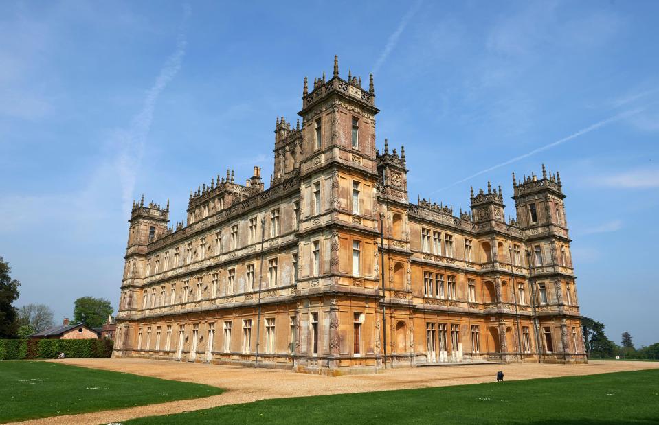  44 large mounted photographs of Highclere Castle, pictured today, the staff and estate are up for auction. They are expected to raise £500