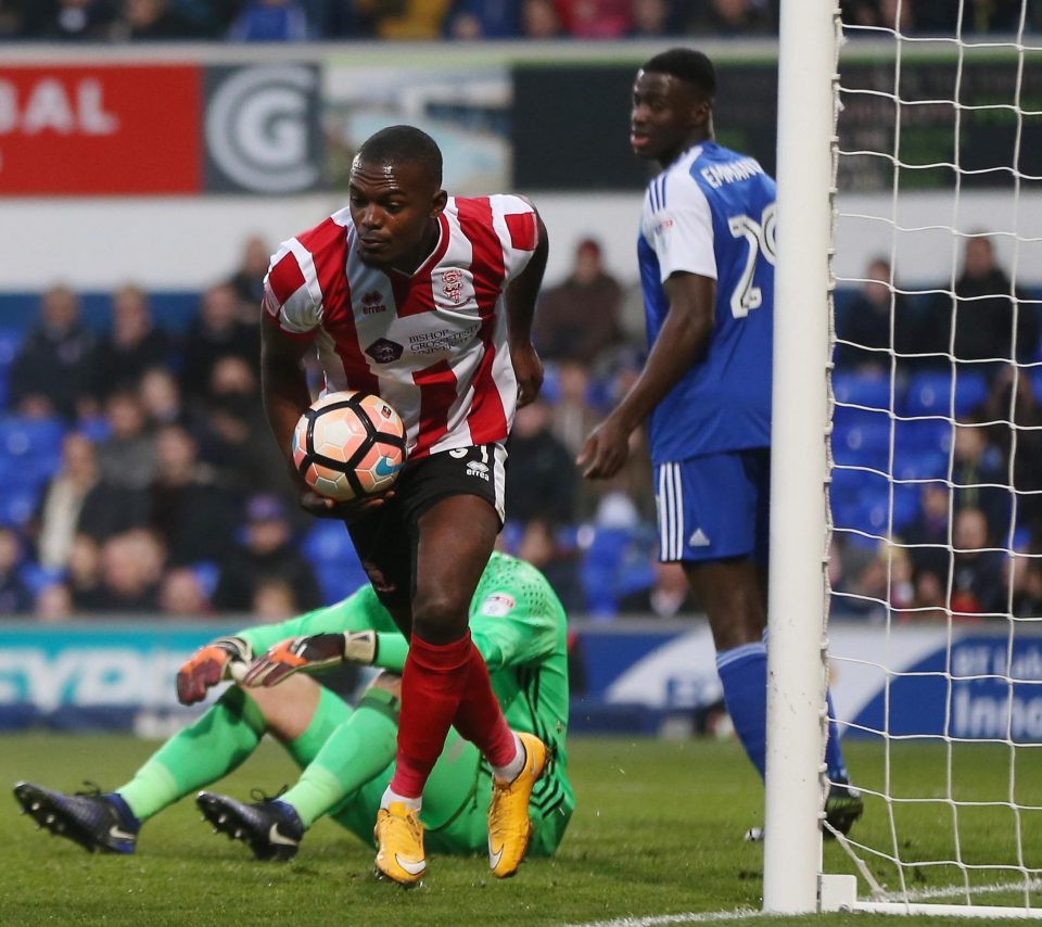  Theo Robinson scored twice as Lincoln City drew with Ipswich Town of the FA Cup