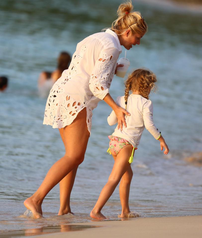  The family spent the day running around and playing on the beach