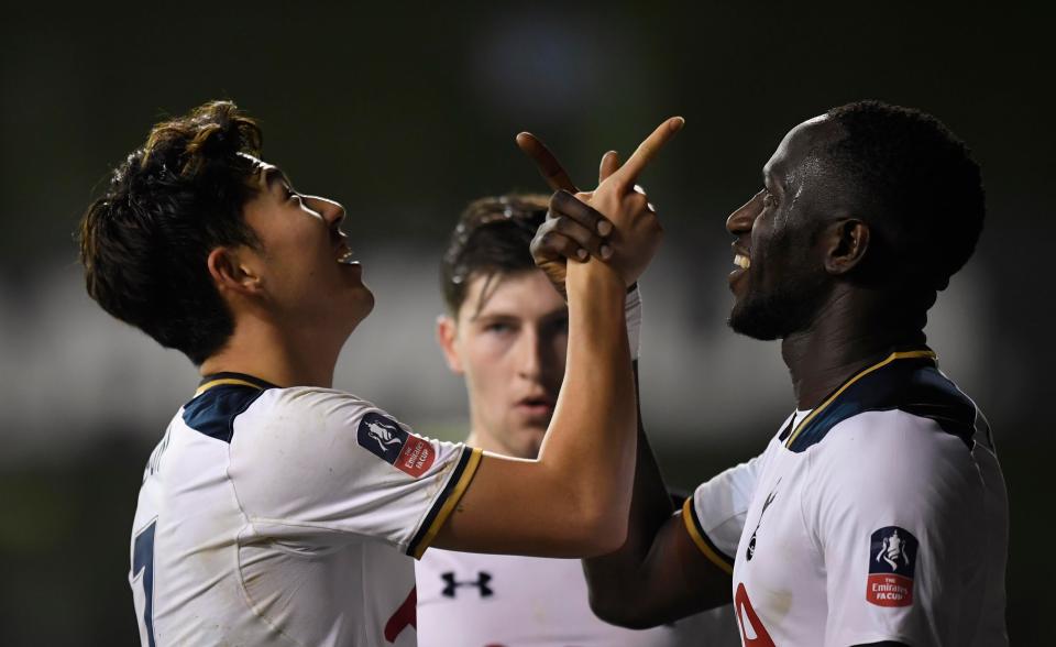  Son points to the sky after netting the second