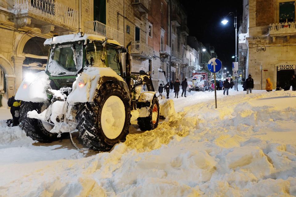  A tractor was deployed to try to clear some snow in Santeramo