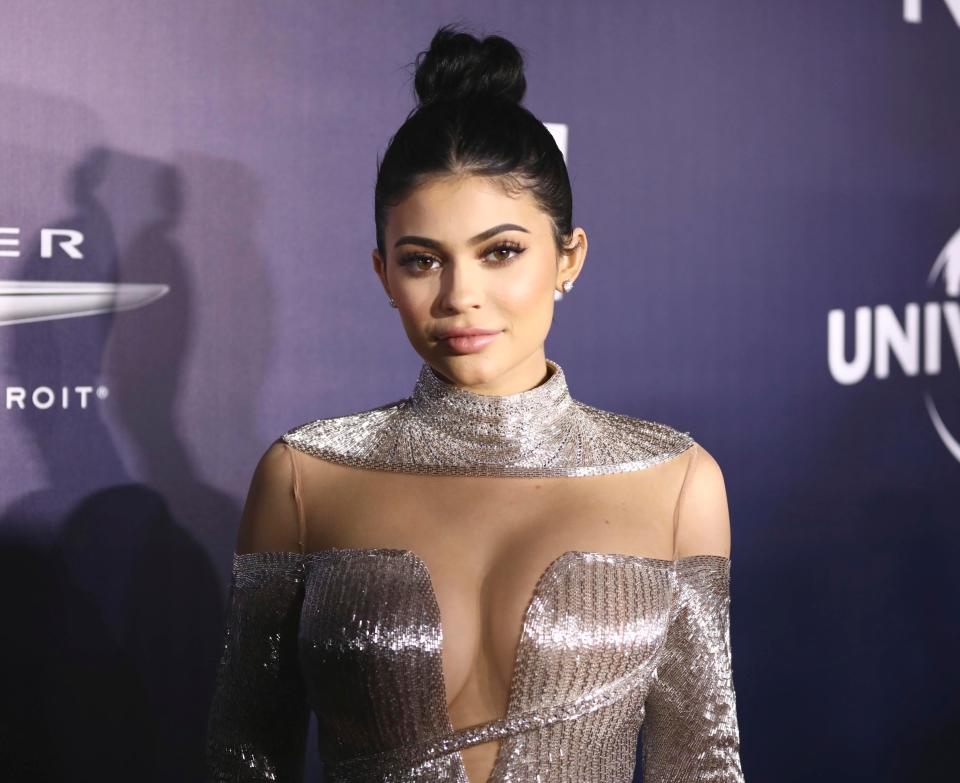  Kylie put her cleavage front and centre in a low-cut gown