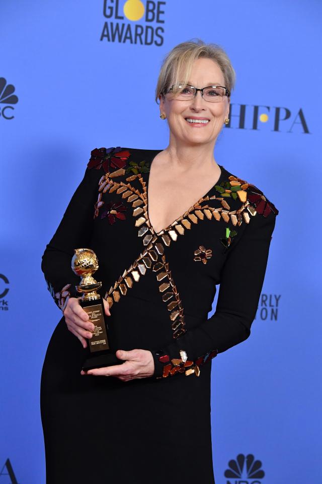  Streep poses with her award in the press room during the 74th Annual Golden Globe Awards at The Beverly Hilton Hotel