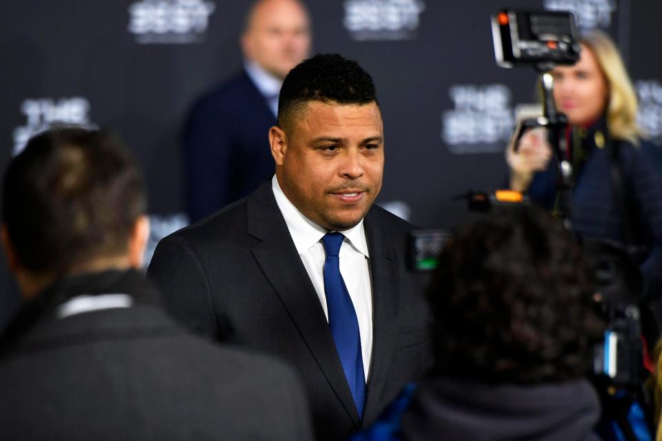  Brazil legend and former Fifa Men's Best Player winner Ronaldo looks dapper as he turns up in a suit and tie