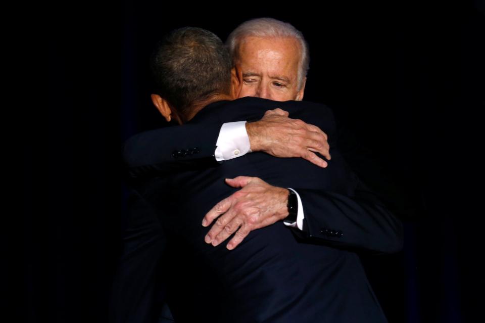  Obama also hugged his emotional vice president as the pair prepare to hand over power to Trump and his team