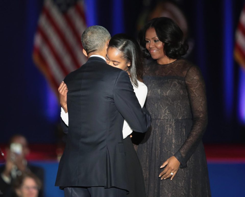  The outgoing first family shared a heartwarming embrace on the stage