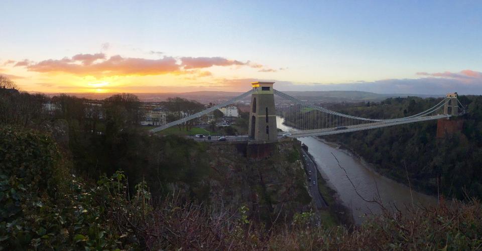  The sun rises over the Clifton Suspension Bridge in Bristol, as high winds brought travel chaos and power cuts across the country