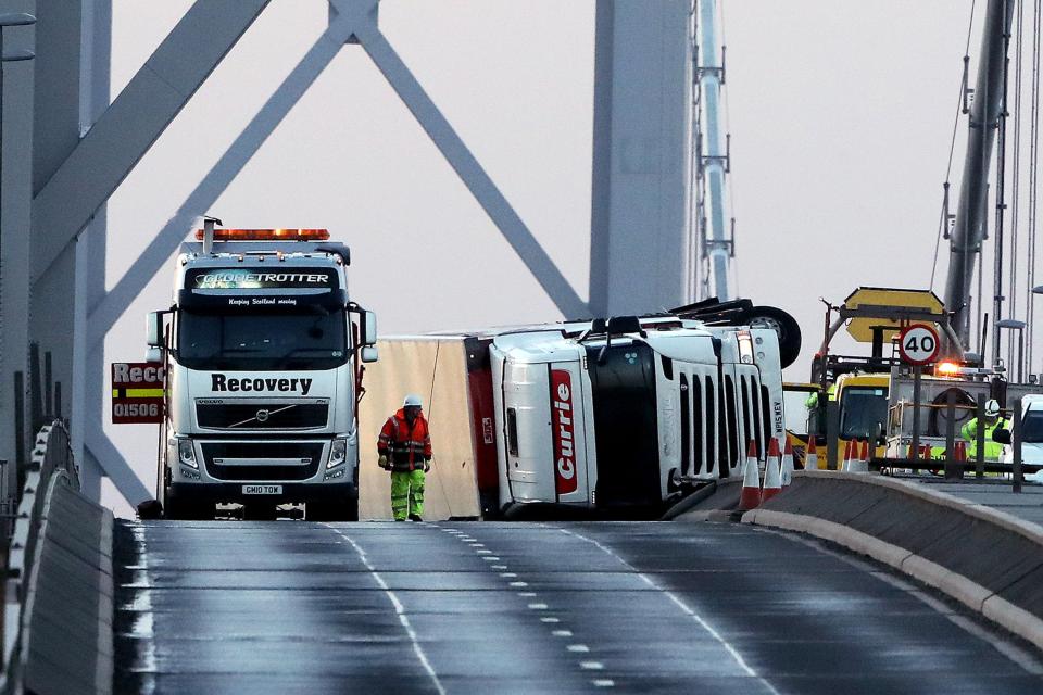  The Forth Road Bridge near Edinburgh has been closed in both directions after a lorry was blown over at around 2am