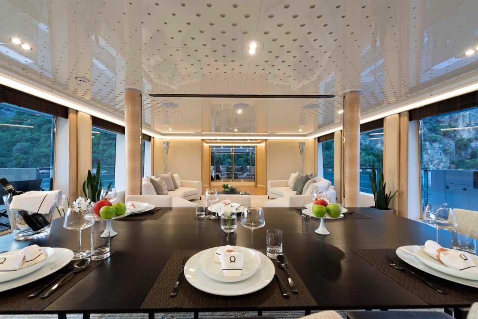  The dining area leads into an open plan living space where there are plush white furnishings and an oriental theme throughout