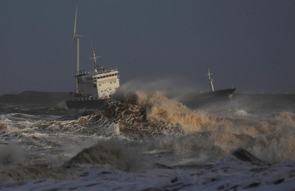  A tanker battles through heavy seas as it enters the River Mersey near Liverpool