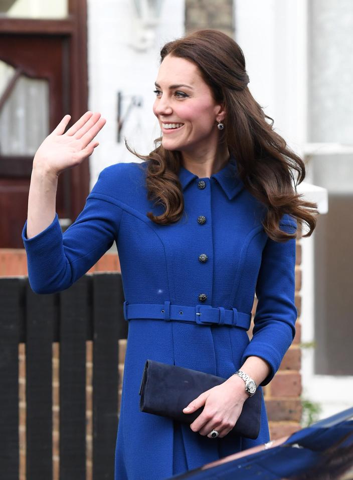  It's the second time Kate has worn bespoke British brand Eponine in public, while she kept half her hair tied up loosely at the back