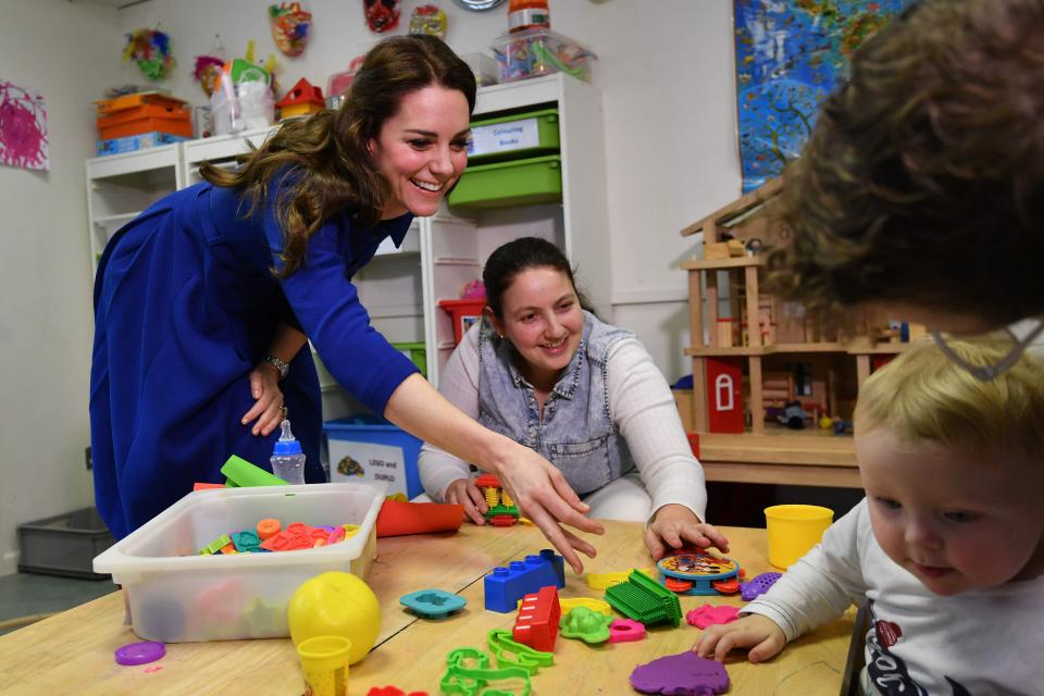  Kate can be seen chatting to Riley's mum as the youngster plays with toys at the unit in Holloway, North London