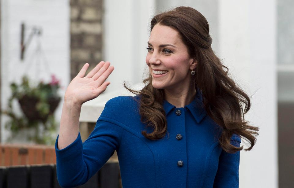  The Duchess of Cambridge smiles and waves back smiles as she leaves an Early Years Parenting Unit at the Anna Freud Centre