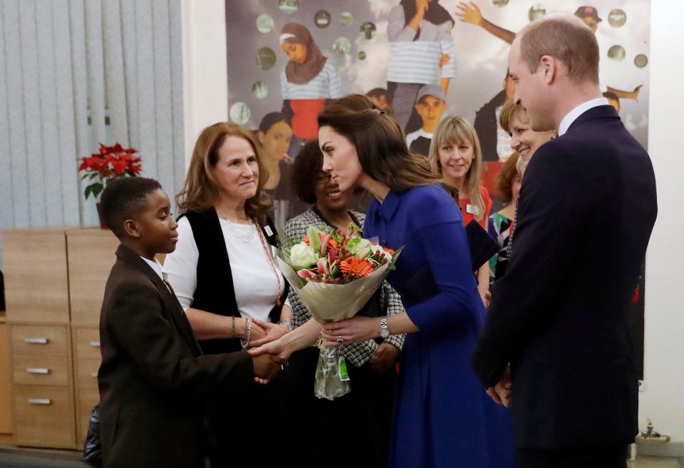  The Royals were greeted with flowers by a young boy named Shinobi as they arrived at the centre in Stratford, east London, today