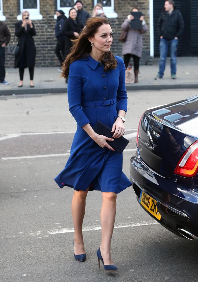  Kate stepped out in a gorgeous cobalt blue belted coat for the visit to both the children's centre and the bereavement centre