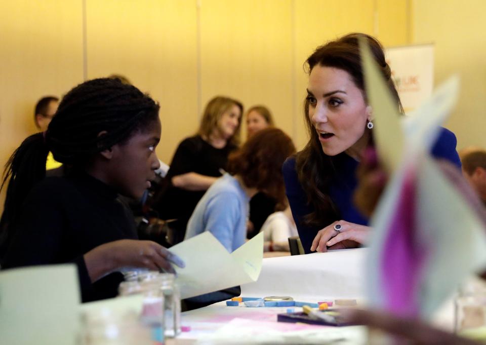  Kate speaks with a young girl at the bereavement centre as they make crafts and share memories of their loved ones