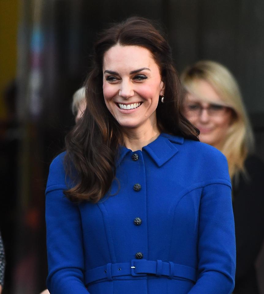  Kate wore a £1,650 blue Eponine belted coat for the visit to east London today