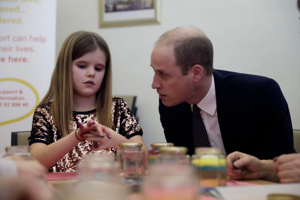  Prince William comforts nine-year-old Aoife who lost her dad to pancreatic cancer